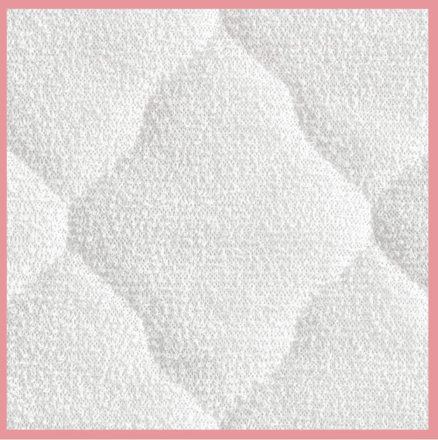 Detalle de funda de colchón acolchado reversible.